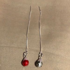 Multi colored threaded earrings.